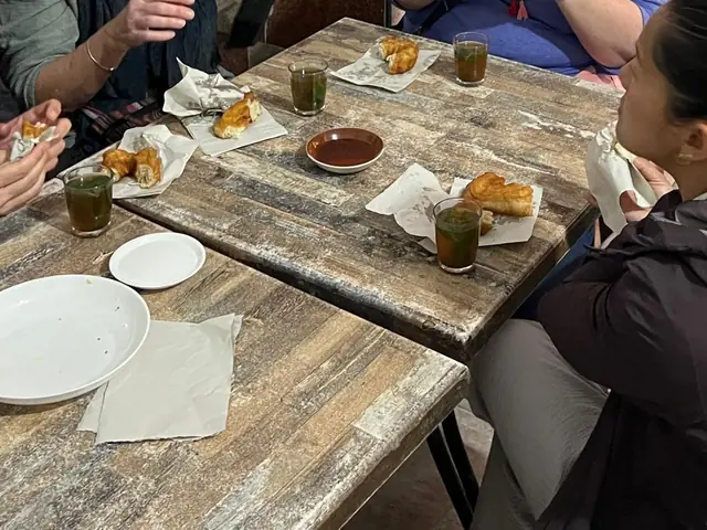 Mint tea and pastries at a local table
